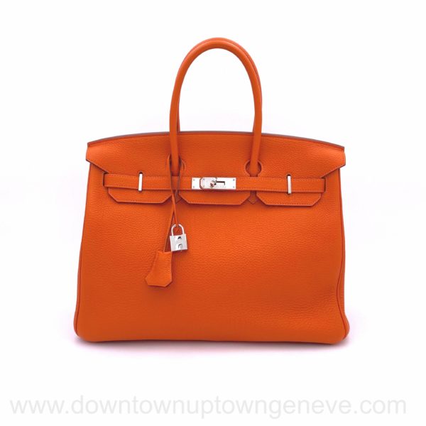 small red birkin bag