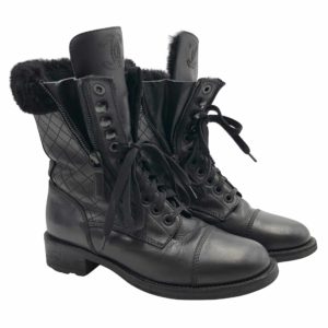 PAIR OF BLACK LEATHER LACEUP TALL COMBAT BOOTS CHANEL  A Collection of a  Lifetime Chanel Online  Jewellery  Sothebys